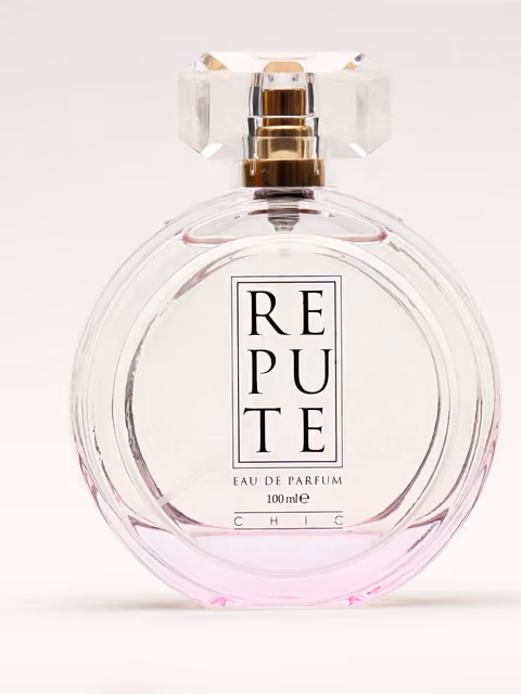 Perfume bottle photographed against a clean white set